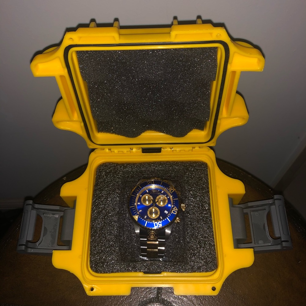 Men’s Invicta gold and silver watch
